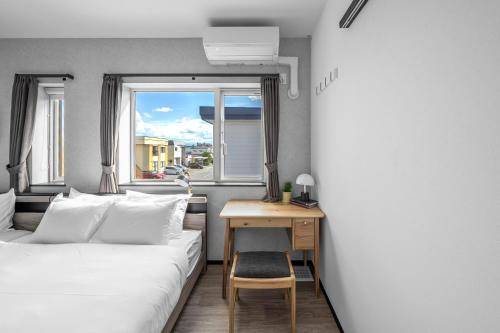 Postel nebo postele na pokoji v ubytování HOSHIYADO NAGAYAMA - Vacation STAY 68332v