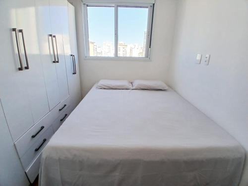 Ένα ή περισσότερα κρεβάτια σε δωμάτιο στο Apartamento próximo ao Allianz Parque e Bola de Neve Lapa