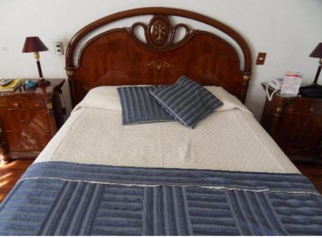 Postel nebo postele na pokoji v ubytování Hotel Montecarlo Viña del Mar