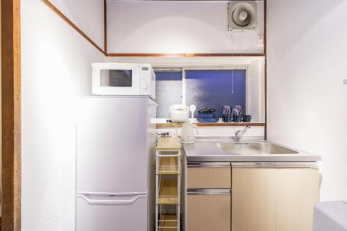 Køkken eller tekøkken på Ashigarashimogun - Apartment - Vacation STAY 74141v