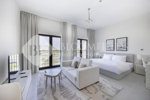 Ένα ή περισσότερα κρεβάτια σε δωμάτιο στο Bloomfields Cozy StuYas Golf Collection