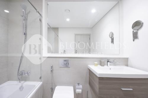 Ένα μπάνιο στο Bloomfields Cozy StuYas Golf Collection