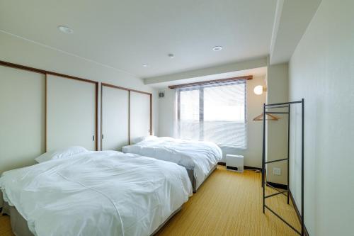 Кровать или кровати в номере Uejima Building 4F - Vacation STAY 20520