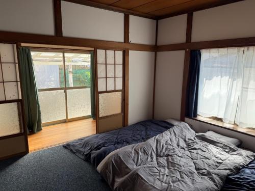 Voodi või voodid majutusasutuse Kuu-chan no Ie - Vacation STAY 77676v toas