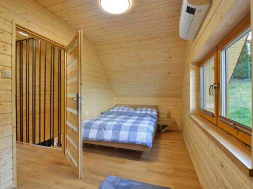 Postel nebo postele na pokoji v ubytování Domek u Pusi z jacuzzi