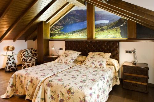 Postel nebo postele na pokoji v ubytování Hostal Raices