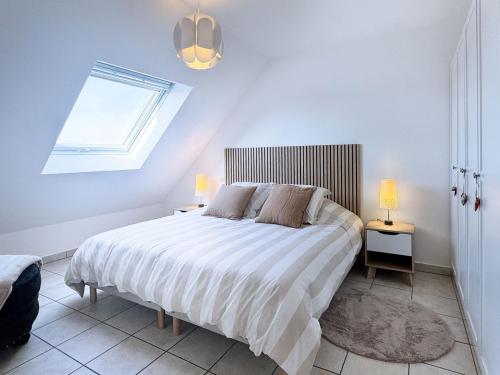 Postel nebo postele na pokoji v ubytování Les Frangines