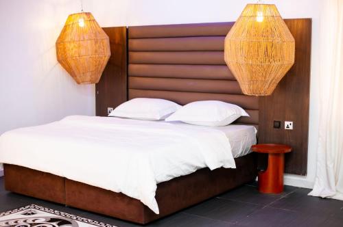 Voodi või voodid majutusasutuse Seagrass beach house toas