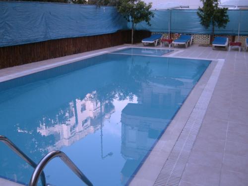 The swimming pool at or close to Best Life Apart Hotel