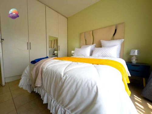 Llit o llits en una habitació de Sunset Haven BnB