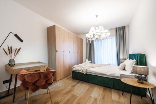 Postel nebo postele na pokoji v ubytování High-End Suites - Terrace Views ApartHotel