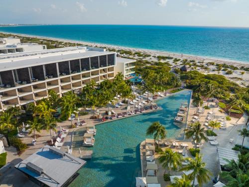 an aerial view of the resort and the beach at TRS Coral Hotel - Adults Only - All Inclusive in Cancún