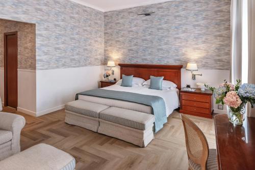 Giường trong phòng chung tại Starhotels Terminus