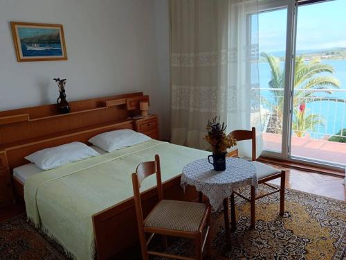 Ένα ή περισσότερα κρεβάτια σε δωμάτιο στο Apartment Jadris