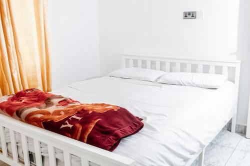 Voodi või voodid majutusasutuse Bijilo toas