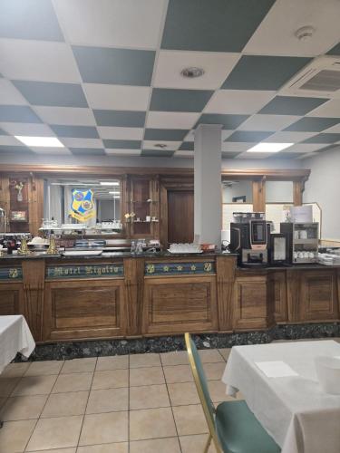 Veitingastaður eða matsölustaður á Hotel Rigolfo