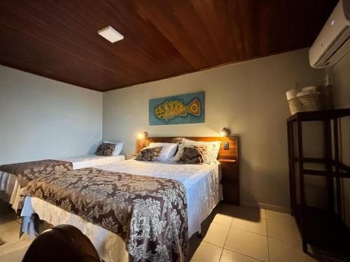 En eller flere senge i et værelse på Bela Vista Lodge