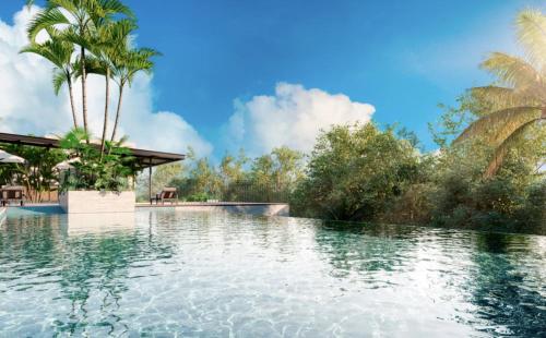 a pool at a resort with palm trees at Refúgio Amazônico com Piscina e Natureza in Manaus