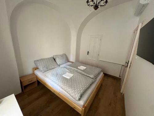 Postel nebo postele na pokoji v ubytování Cassovia Hostel