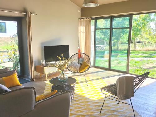 Χώρος καθιστικού στο Le chai du Marais Sauvage