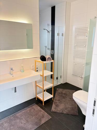 Koupelna v ubytování Zentral gelegenes Design-Loft für höchste Ansprüche