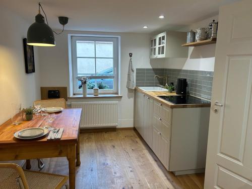 Η κουζίνα ή μικρή κουζίνα στο Ferienwohnung in Mühleneck