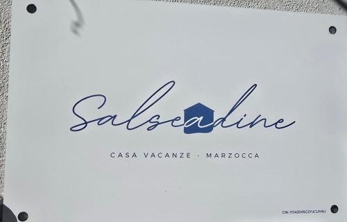 a sign for a restaurant with the word saldenine at Salseadine - Senigallia in Marzocca di Senigallia