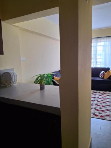 Zona de estar de Lin PrimeStay Suites Kisumu