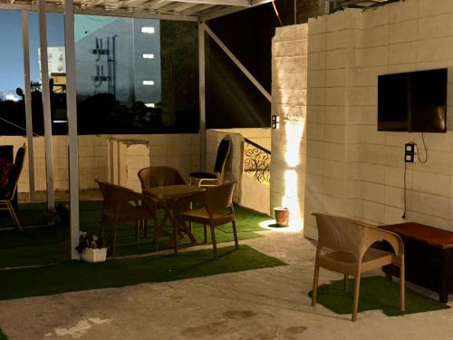 TV a/nebo společenská místnost v ubytování Great Pyramids view Lodge