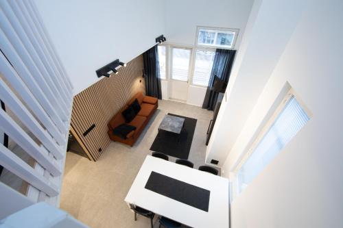 TV a/nebo společenská místnost v ubytování Ski Center Alpine Houses A6