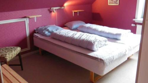 Ένα ή περισσότερα κρεβάτια σε δωμάτιο στο Cozy Holiday Apartment In Scenic Surroundings