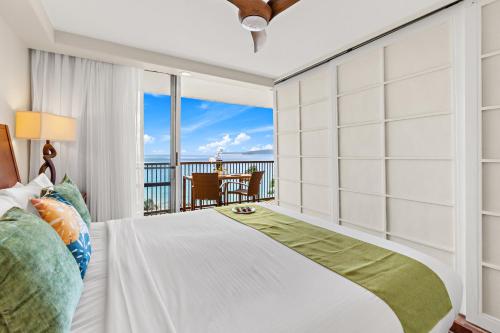 Postel nebo postele na pokoji v ubytování Mana Kai 810