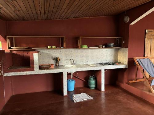 Kuchyň nebo kuchyňský kout v ubytování Villa Melissa97- Bât2 Superbe coin à Dzamandzar