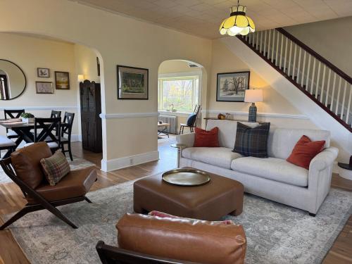 a living room with a couch and a table at Welcome to Duck Run in Mackeyville, Pennsylvania! in Mill Hall