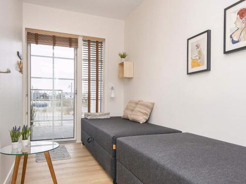 Un pat sau paturi într-o cameră la 6 person holiday home in Ringkøbing-By Traum