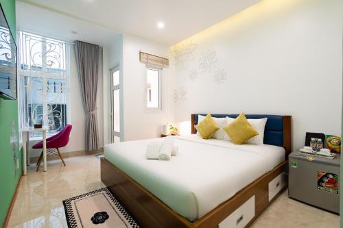 Ένα ή περισσότερα κρεβάτια σε δωμάτιο στο Adventure Hotel