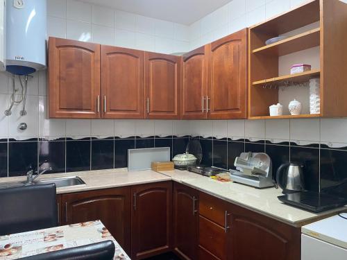 Kuchyň nebo kuchyňský kout v ubytování Adna Art Apartment