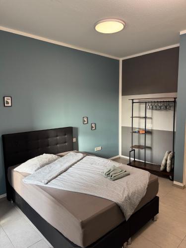 Ένα ή περισσότερα κρεβάτια σε δωμάτιο στο NaLa Nest - small but nice