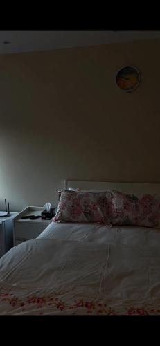 a bed with a pillow on top of it at عزبة وادي السدر in ‘Ashashah