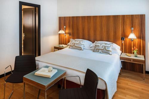 Ένα ή περισσότερα κρεβάτια σε δωμάτιο στο Starhotels Anderson