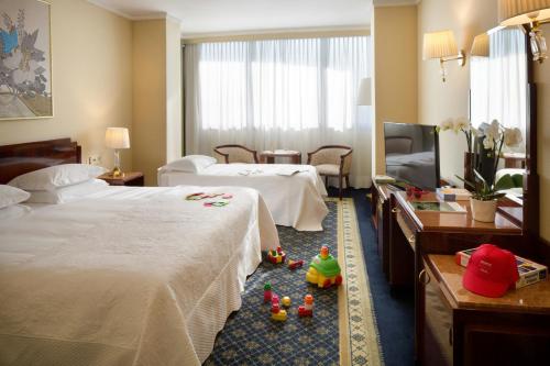 Postel nebo postele na pokoji v ubytování Starhotels Du Parc