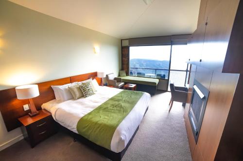 Postel nebo postele na pokoji v ubytování Binna Burra Sky Lodges