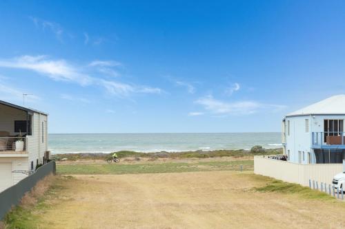 a view of the ocean from a beach house at 32 Hargreaves-Linen Included-Pets Negotiable-Wi-Fi in Middleton
