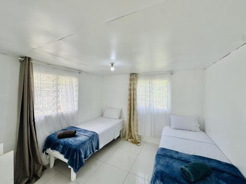 Voodi või voodid majutusasutuse Pearl Cottage - Private Rooms 2 Mins Drive to Town toas