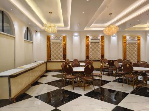 a meeting room with a table and chairs at B Dot in Gaushala