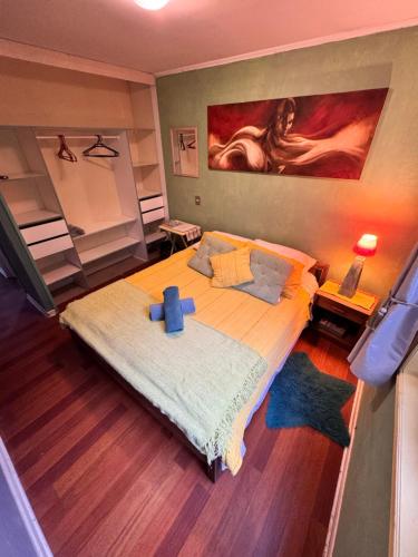 Ένα ή περισσότερα κρεβάτια σε δωμάτιο στο Hortensias del Lago