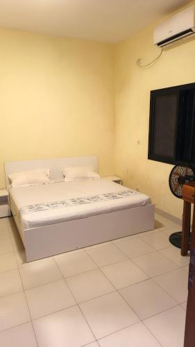 Postel nebo postele na pokoji v ubytování résidence casa meublé