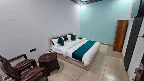 Ένα ή περισσότερα κρεβάτια σε δωμάτιο στο Hotel O Sukoon Guest House