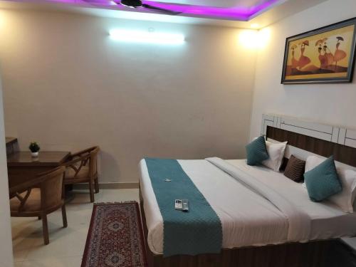 Postel nebo postele na pokoji v ubytování Collection O Uttaranchal University Premnagar