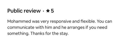 a screenshot of a cell phone with the text bubble review at Charming Home in Negombo